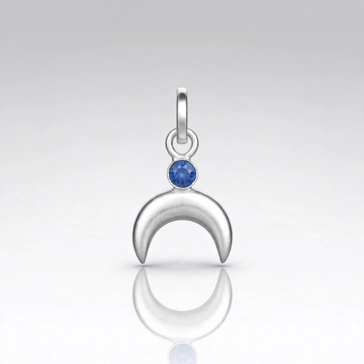 Sterling Silver Crescent Moon Pendant with Blue Sapphire CZ Accent